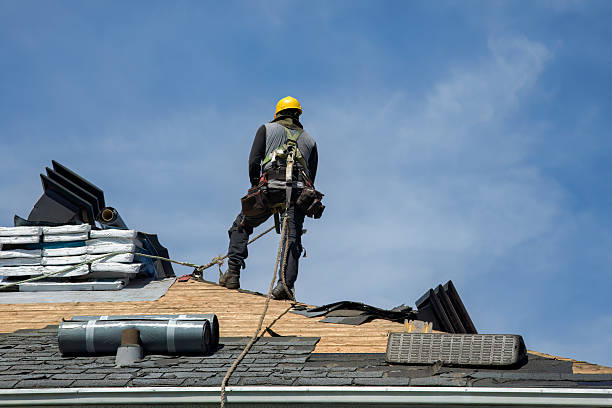 Professional Roof Replacement technician working in Chester, PA